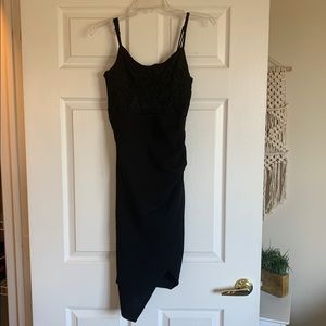 Black dress with lace detail by Almost Famous, size medium, worn once